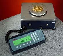 Electronic Counting Scale inventories small parts.