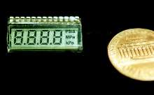 Miniature 4-digit LCD features 0.174 in. high characters.