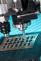 Waterjet Cutting System offers taper compensation.