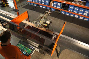 Cutting Machine automates positioning, compound mitering.