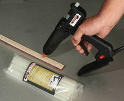 Professional Glue Gun accelerates tackstrip, trim installation.
