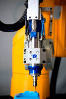 Robot Machining Cell universally adjusts to different tasks.