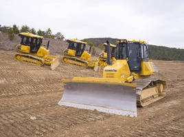 Crawler Dozers feature automatic blade control.