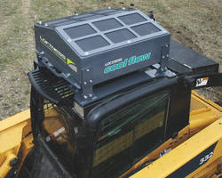 Hydraulic Oil Cooler Attachment enhances skid steer performance.