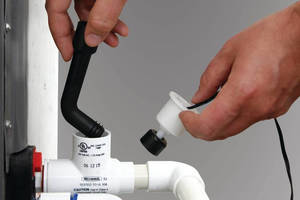 Cleanout Tool dislodges A/C condensate drain line blockages.