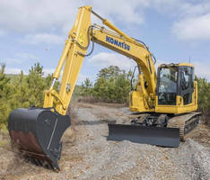 Hydraulic Excavator operates efficiently in confined spaces.