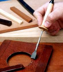 Lacquer Burn-In Knife repairs damaged wood furniture.