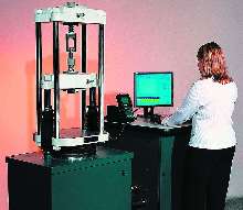 Universal Testing Machine includes handheld controller.