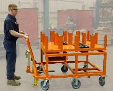 Cart puts parts within reach for assembly line workers.