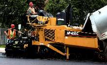 Asphalt Paver offers doors to access all service areas.