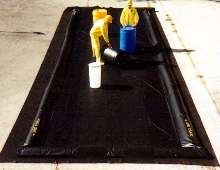 Portable Berm offers ground spill protection.