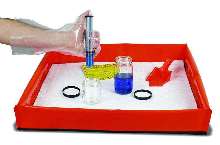 Spill Control Tray provides compact way to store material.