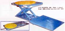 Low-Profile Lift Table has rotating top.