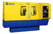 Cylindrical Grinding Machine has full enclosure.