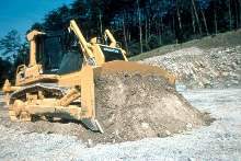 Crawler Dozers feature hydrostatic steering system.