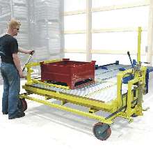 Carts extend reach of conveyor systems.