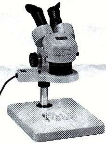 Stereomicroscope employs fluorescent ring illumination.