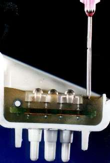 Potting Compound dispenses from disposable static mixers.