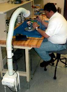 Air Cleaner protects operators during soldering operations.