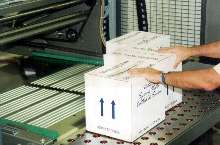 Case Palletizer offers alternative to hand palletizing.