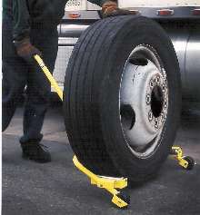 Wheel Dolly moves and aligns mounted tires.