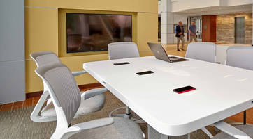 New Smart Conference Table Features Wireless Qi Charging for Smartphones