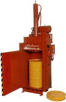 Drum Crusher/Compactor crushes drums down to 4 in.