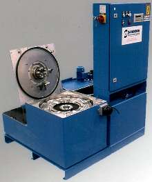 Centrifuge removes oil and sludge from washers.