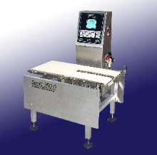 Checkweigher weighs products from 10 g to 10 kg.