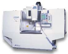 Machining Center features roller type linear ways.