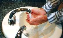 Faucet activates as hands approach from any angle.