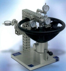 Fixture checks accuracy of car steering wheels.