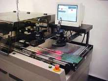 Automatic Printer eliminates PCB handling equipment.
