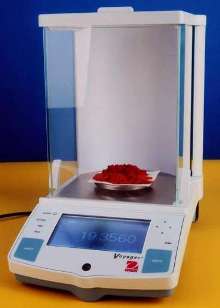 Analytical Balance weighs powders and pills.