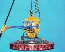 Vacuum Coil Lifter has soft skin foam gripping surface.