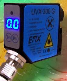 UV Sensor aids in control of adhesive dispensing.