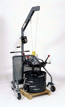 Coil Lifter eliminates manual lifting of strap coils.