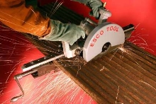 Air-Powered Saw uses quick-clamp assembly.