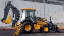 Backhoe incorporates multiple automatic features.