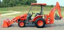 Tractor/Loader/Backhoe is powered by 39 hp diesel engine.