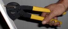 Pliers facilitate extraction of exposed nails.