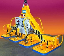 Vacuum Lifter uses oversize pads to grip tooling plate.