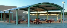 Steel Shelters are offered with custom-curved metal roofs.