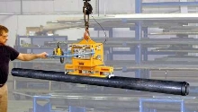 Vacuum Lifter handles pipe from top surface.