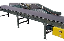 Conveyor Accessory facilitates carton transition to belt.