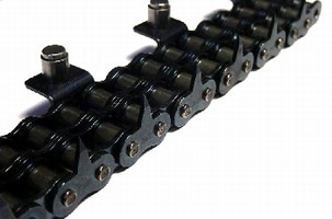 Chains convey hard plastics for packaging.