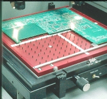 Substrate Support System holds up printed circuit board.