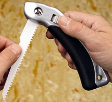 Multi-Purpose Hand Saw has folding design for safety.