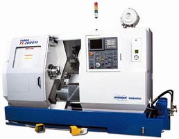 Twin-Turret Turning Center has programmable tailstock.