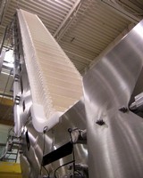 Vertical Conveyor suits sanitary applications.